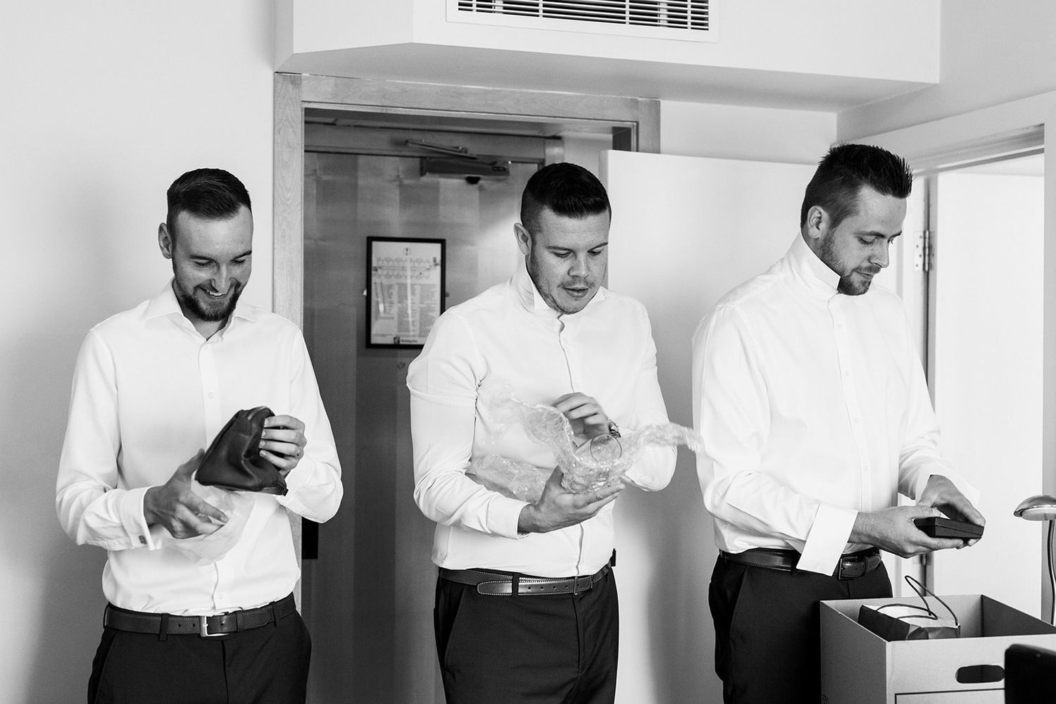 groomsmen getting dressed