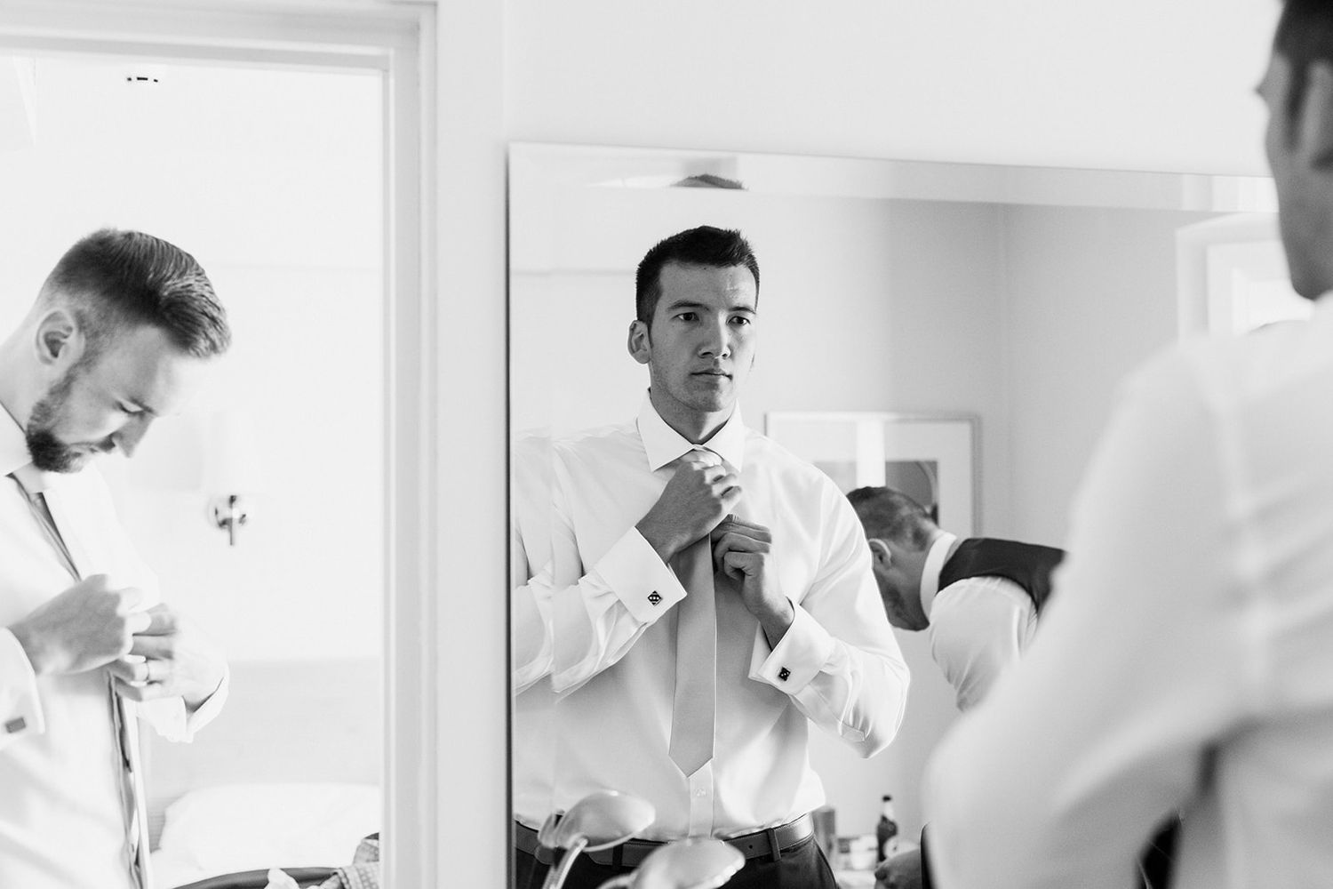 mirror photograph groom tie