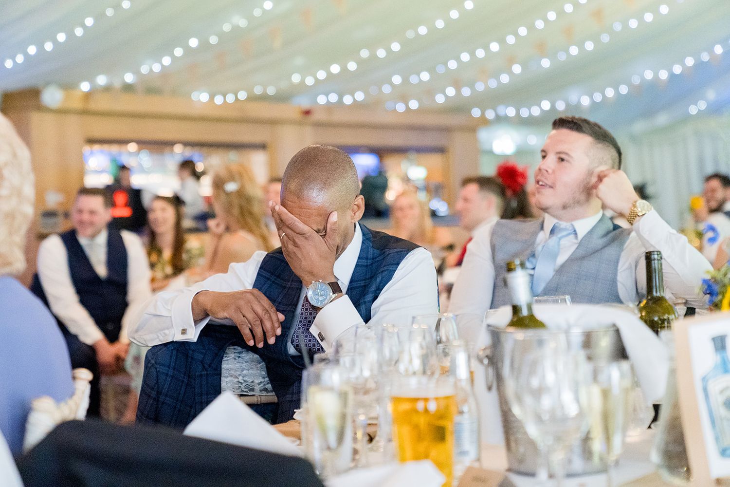 guest laughing at speeches
