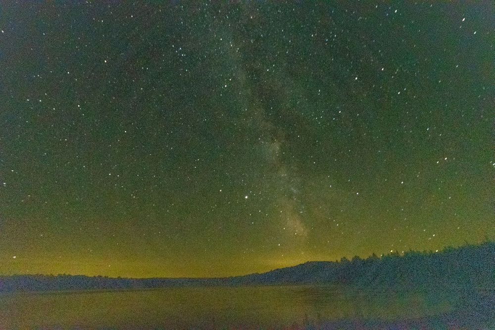 Green colorcast on milky way image