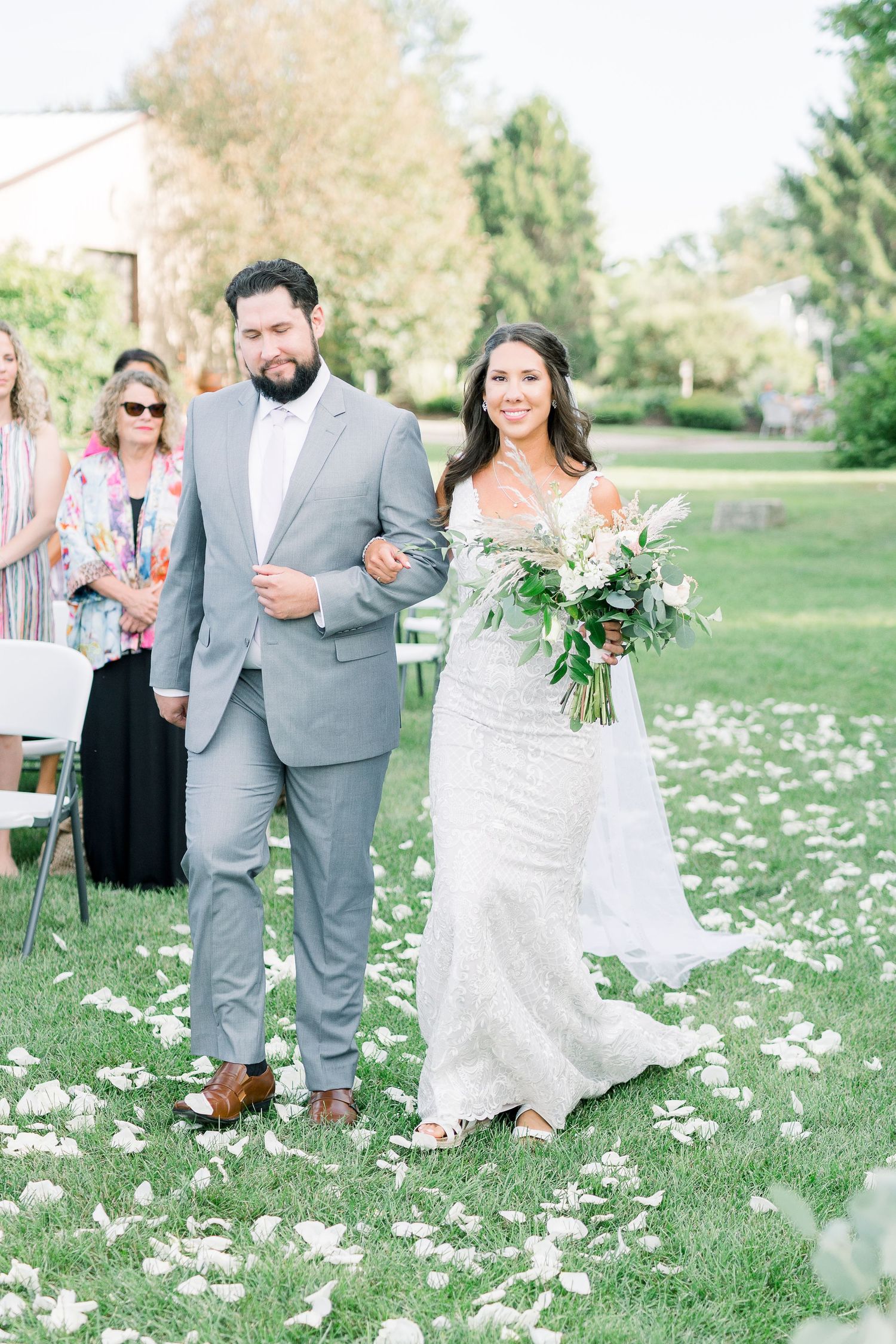 Vineyard photos with white willow events at Prairie Moon Winery wedding in Ames, Iowa