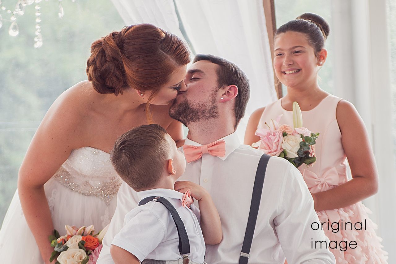 6x4 image of bride and groom kissing while children look on