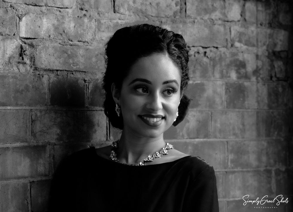 A black and white photograph of a lady