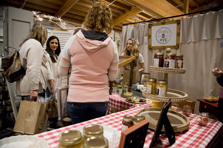 Pinology Puyallup Pickles and Pie Booth customers trying samples of canned pickles and pie filling mix