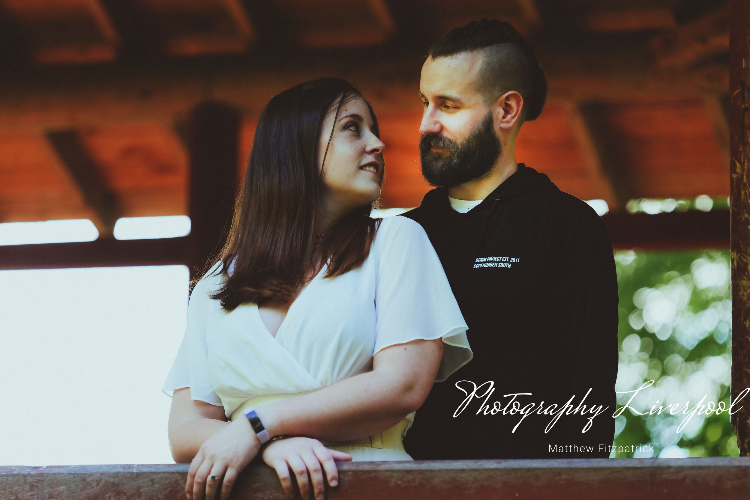 Naturally posed engagement photography at Liverpool Festival Gardens by Photography Liverpool