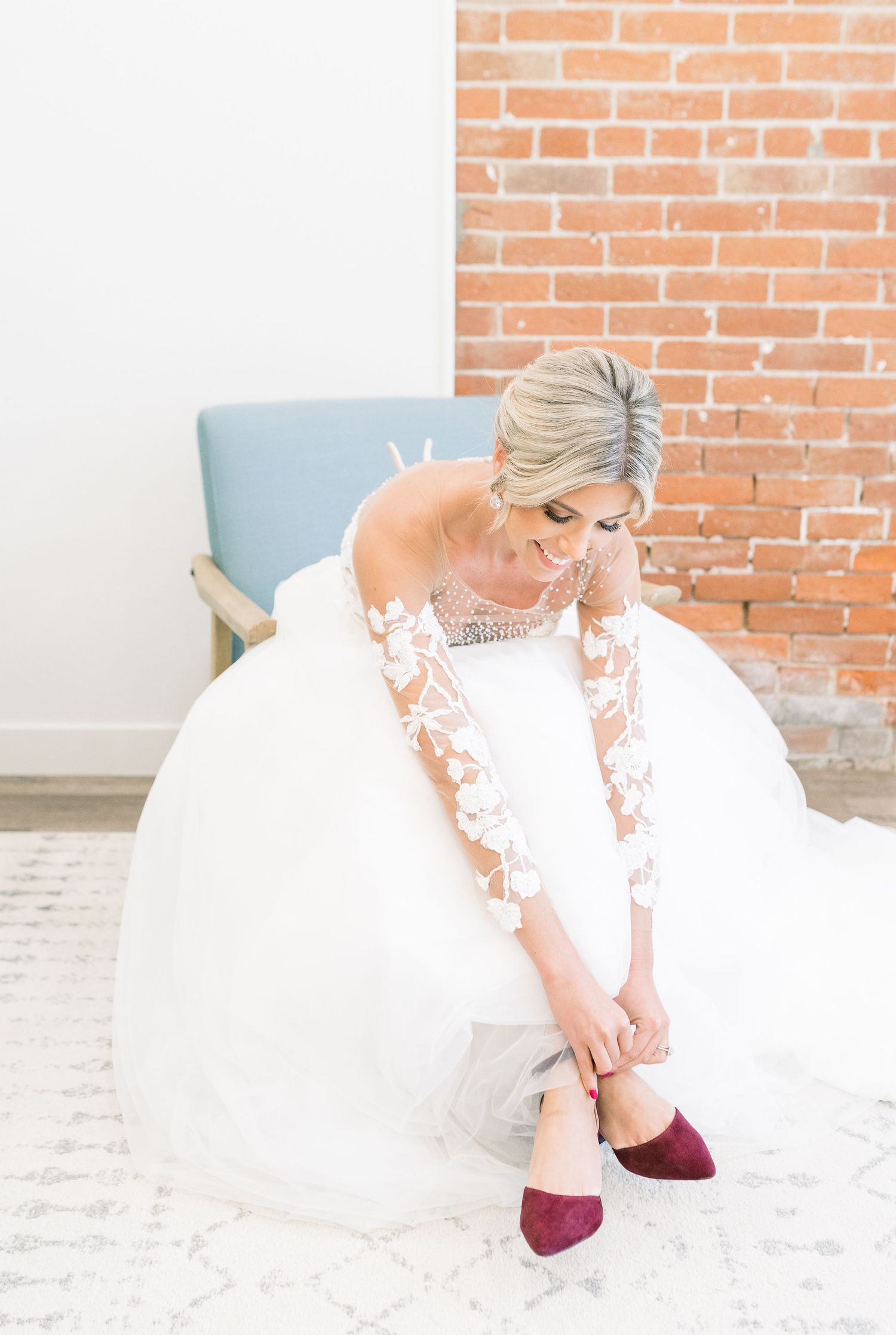 Light and airy 1868 Farmhouse Wedding in Boone, Iowa with Modern Dress gown in bridal quite getting ready photos