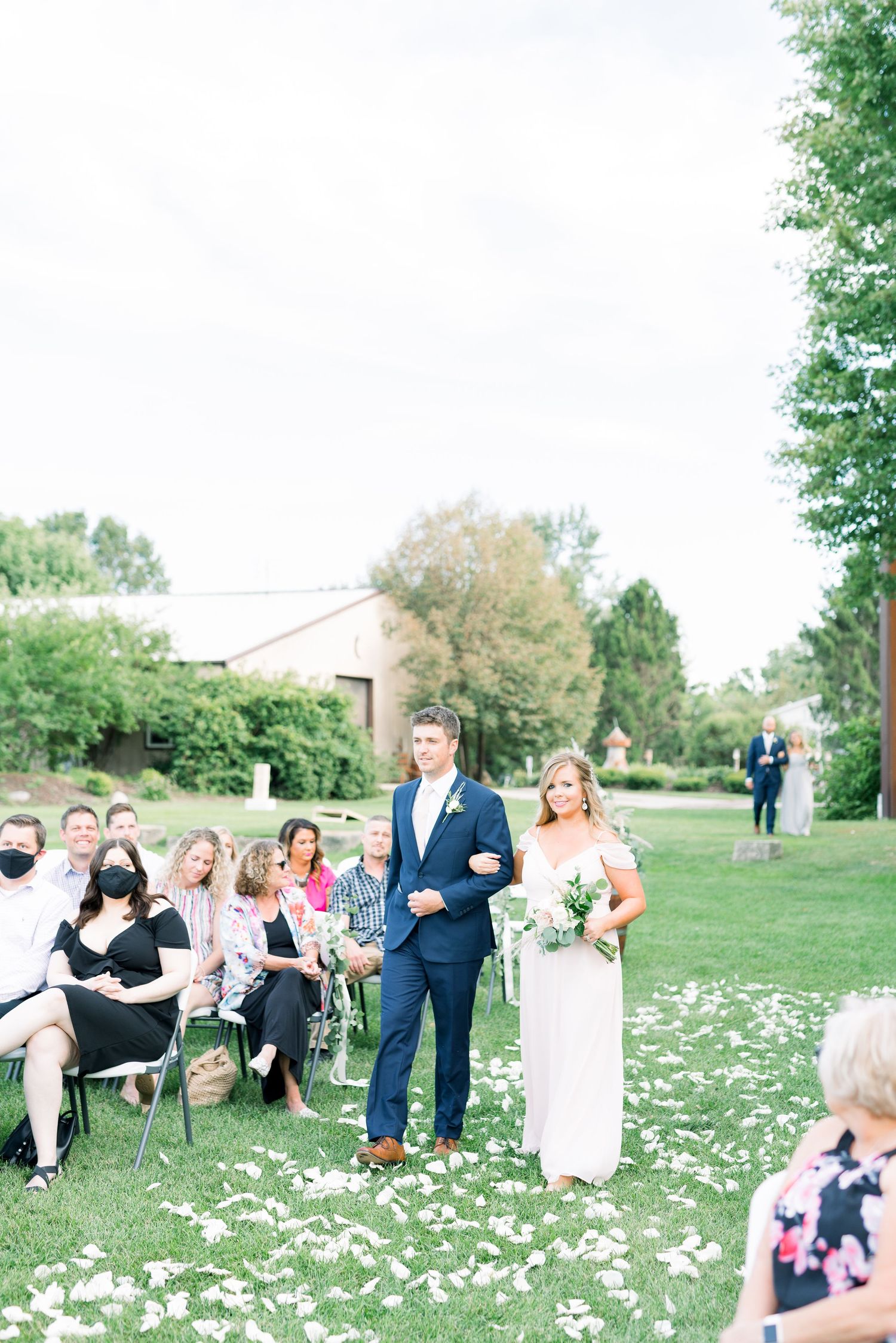 Vineyard photos with white willow events at Prairie Moon Winery wedding in Ames, Iowa