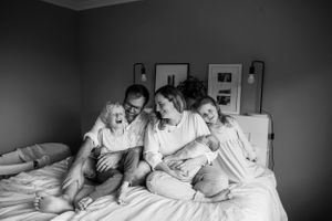candid unposed baby and family