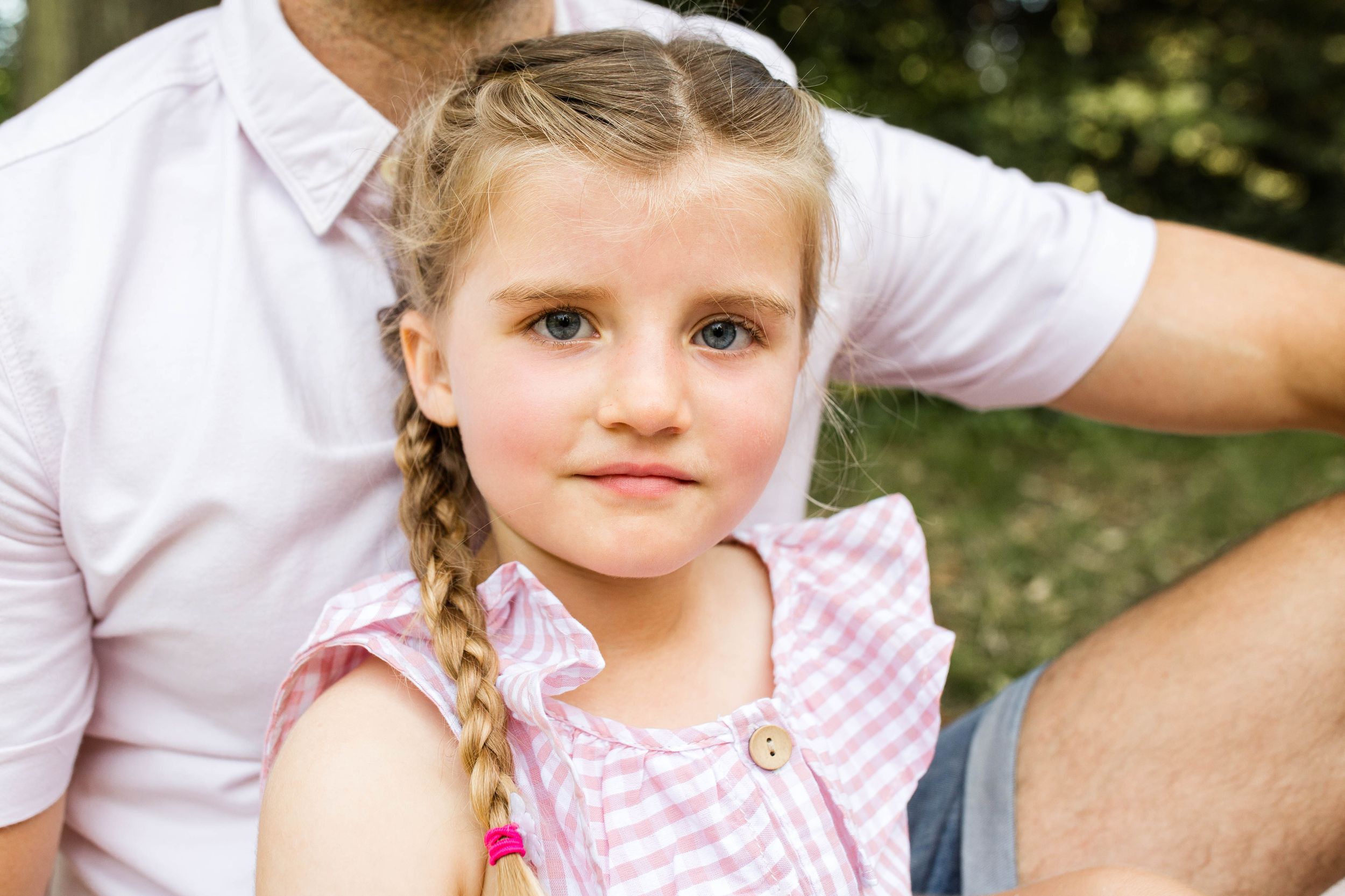 London family photographer blonde girl wearing pink gingham dress
