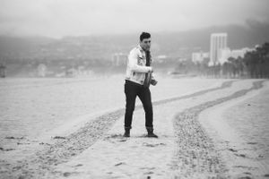 Actor Christian James Levi's Denim Trucker Jacket Jeans Sand Venice Beach Overcast