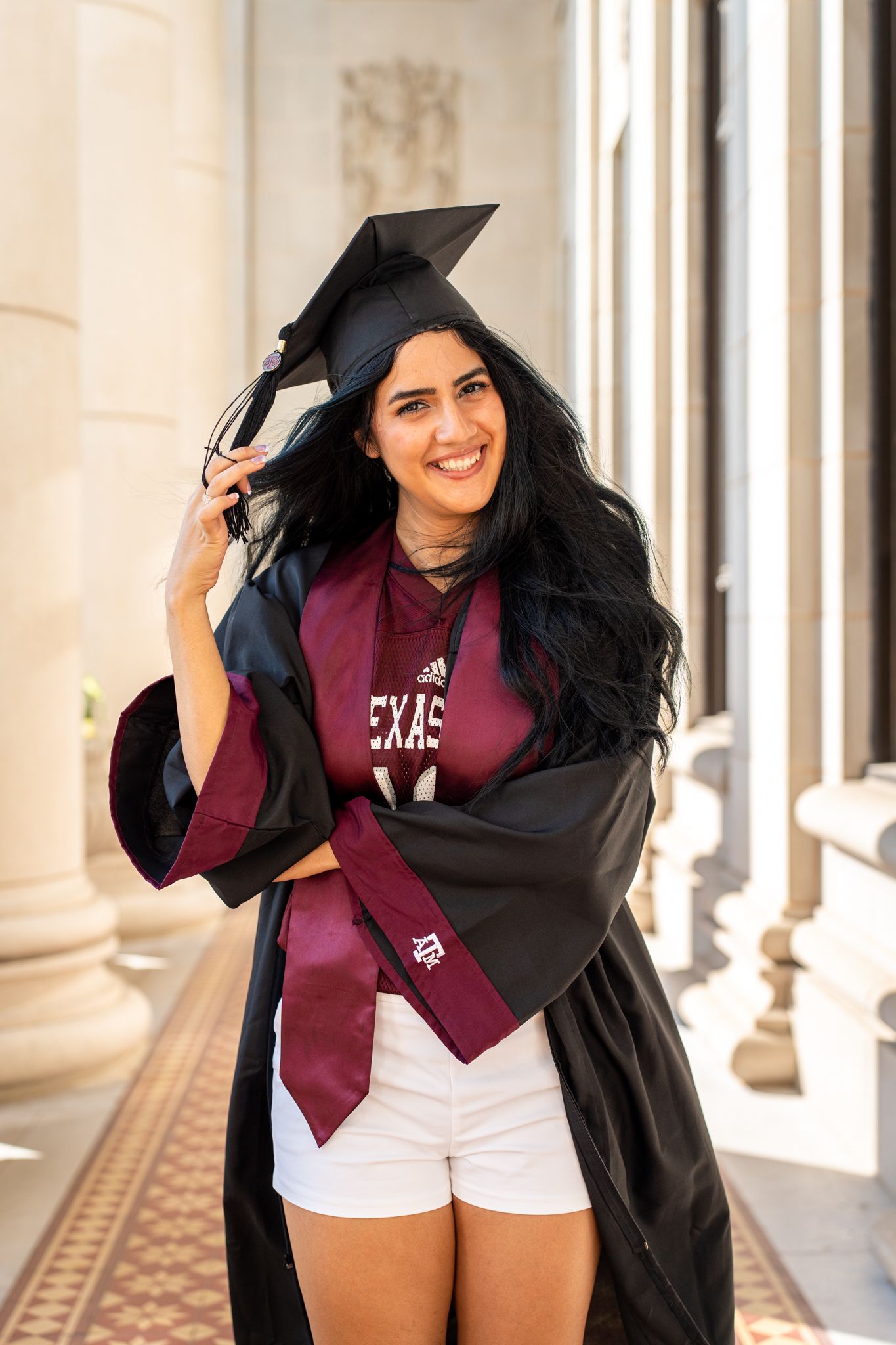 female-graduate-Texas A&M-celebration-maroon-pretty