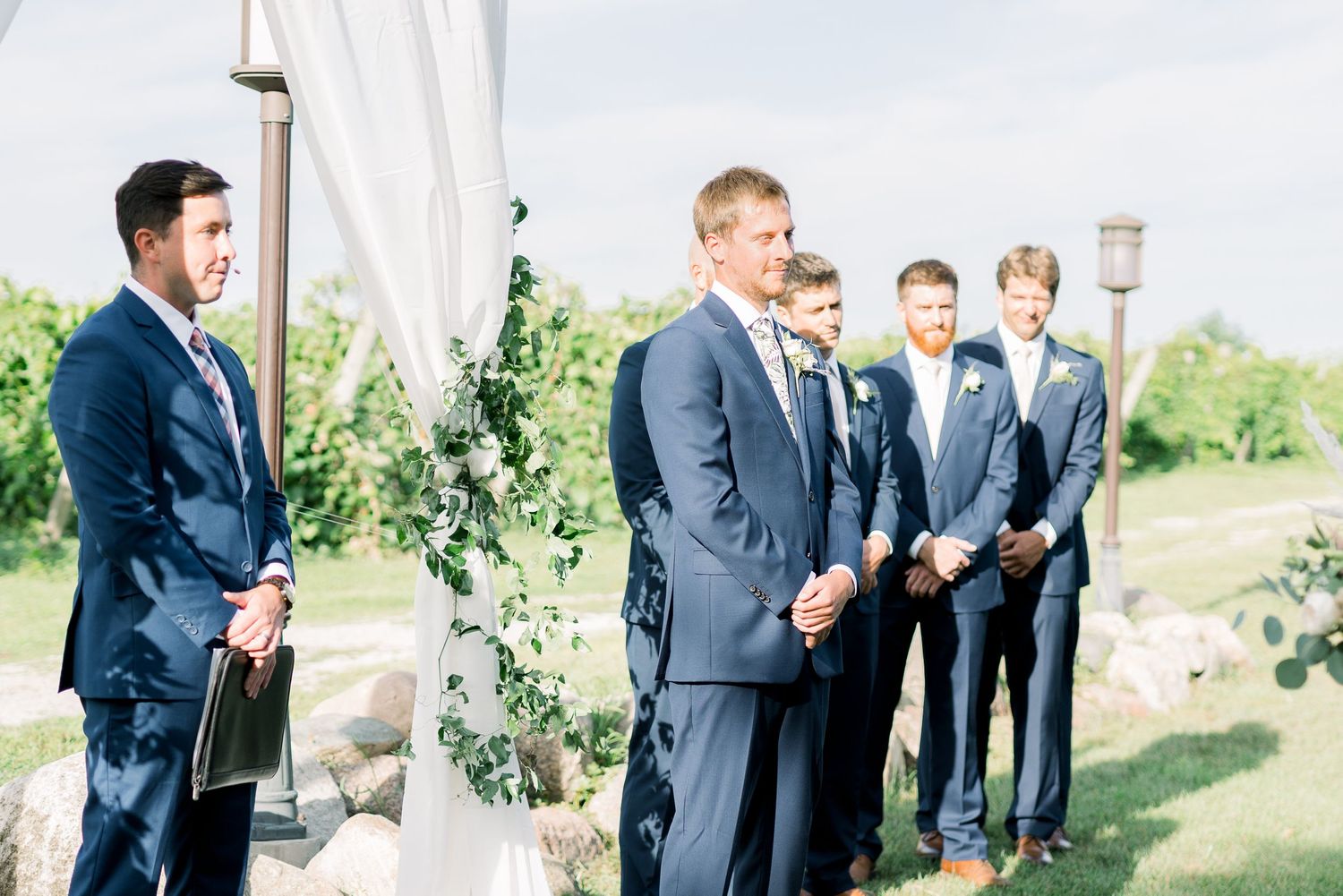 Vineyard photos with white willow events at Prairie Moon Winery wedding in Ames, Iowa