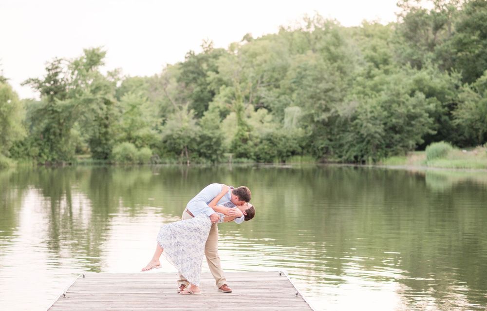 Nicole Openshaw Engagement Photographer, York PA Couple kissing on dock