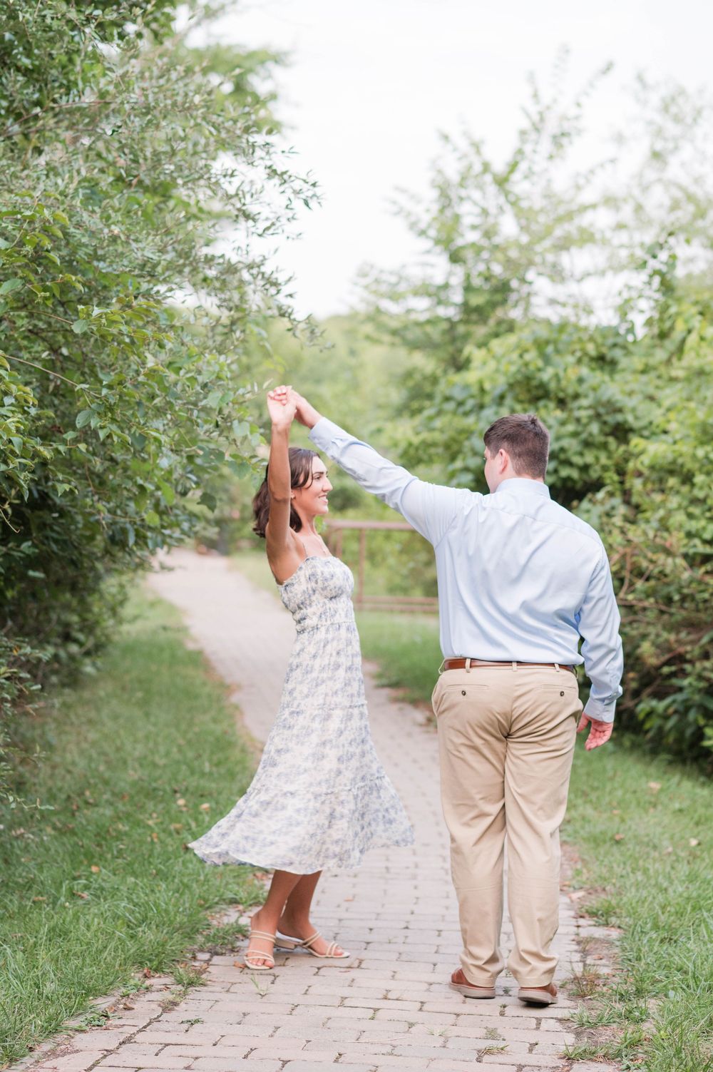 Nicole Openshaw Engagement Photographer York PA Couple Twirling