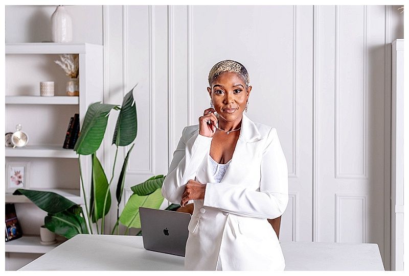 Business woman in white suit for her personal branding photos in South Florida.
