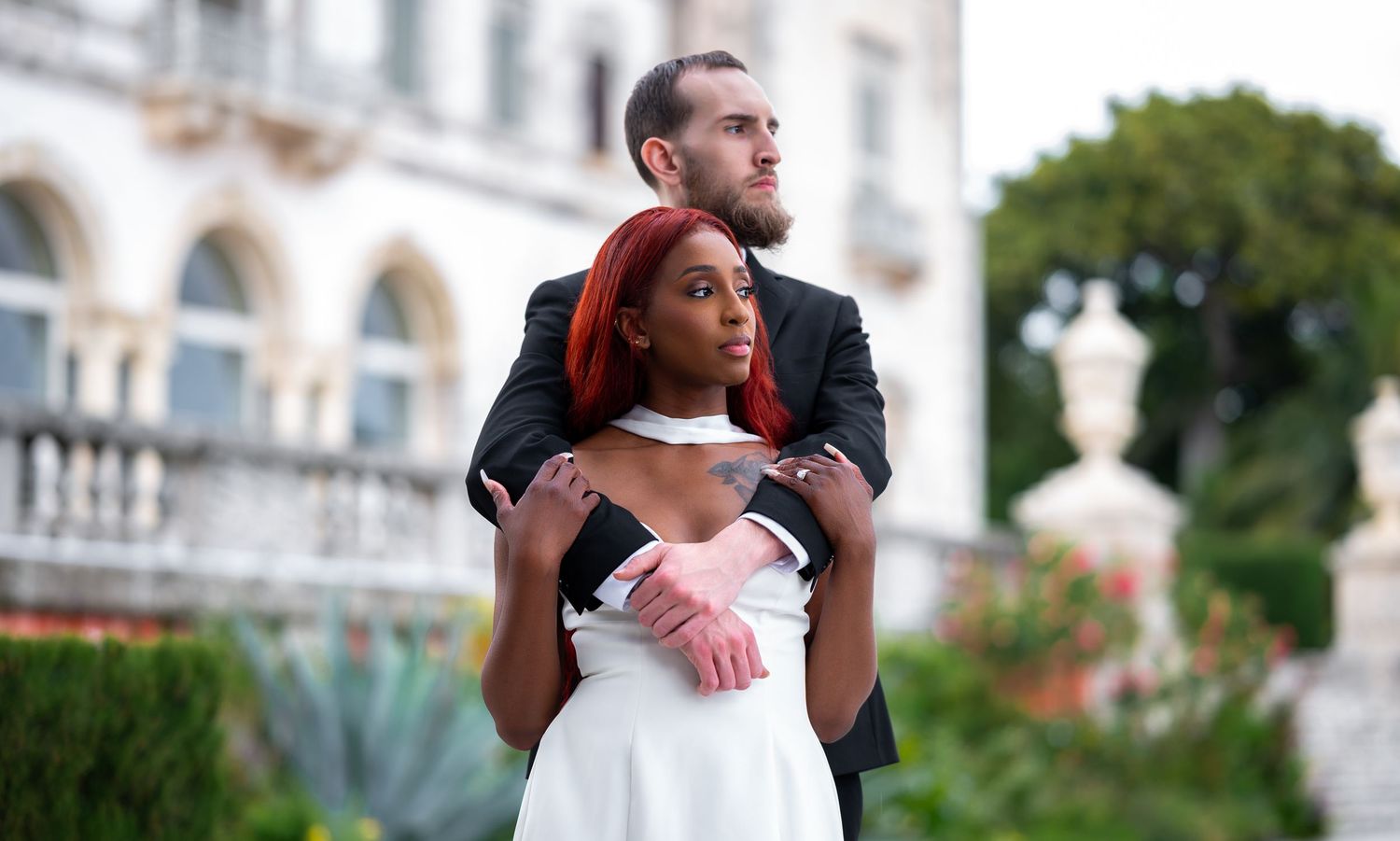 This couple flew to Miami for their destination engagement session at Vizcaya Gardens, captured by Miami proposal photographers.