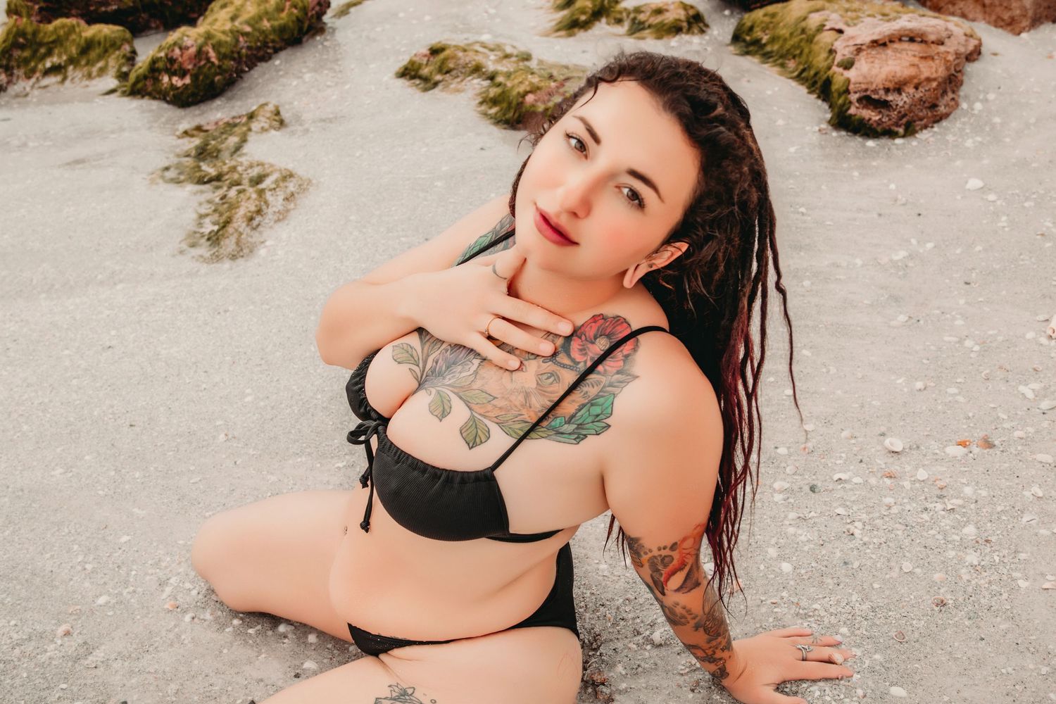 Alternative boudoir session with tattooed client and sunset glow | Body-positive beach photoshoot Siesta Key