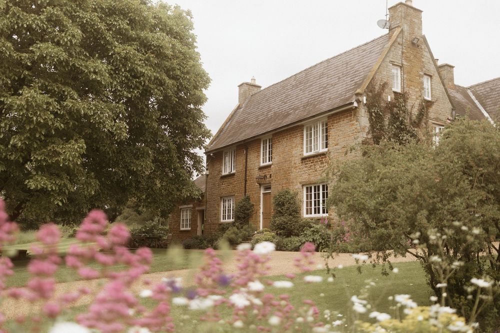 Charming stone cottage with thatched roof at Crockwell Farm wedding