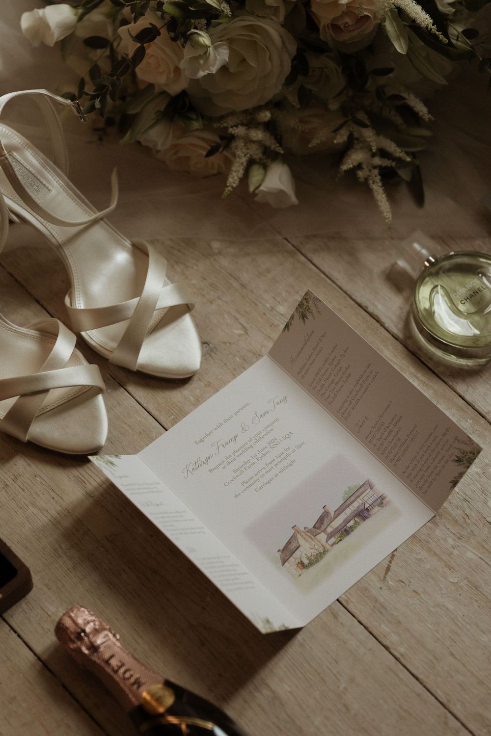 Wedding invitation card with white strappy sandals,at Crockwell Farm wedding