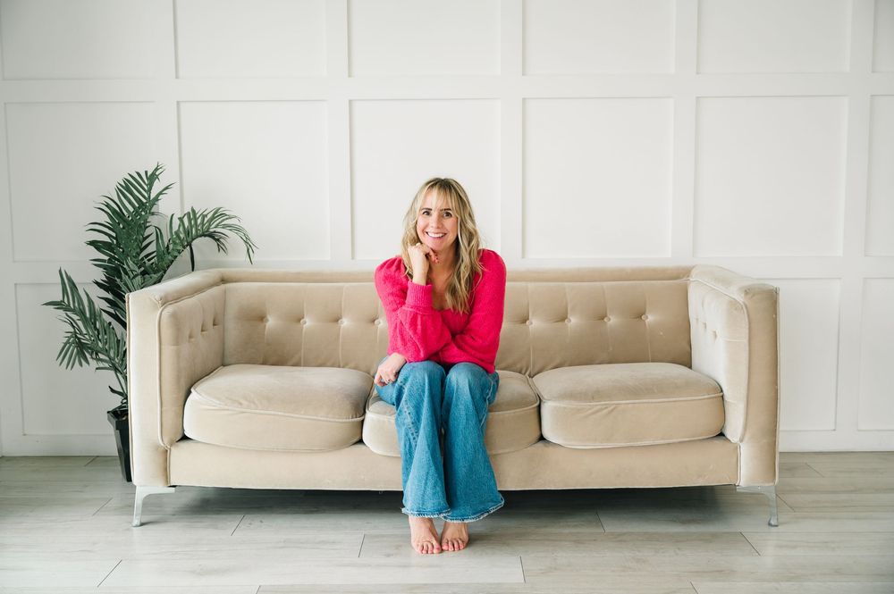 A photo series showing transitions of someone sitting and lying in various positions on a beige couch in a minimalist room.