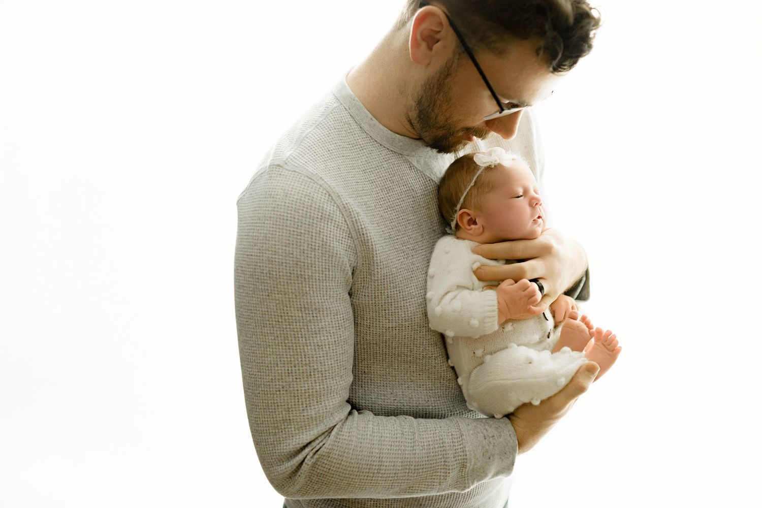 Newborn Photographer Marion indiana with baby girl and her father