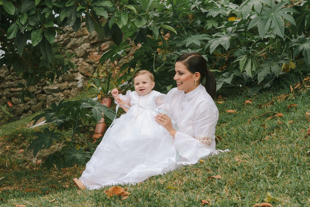 Mom holding baby by NYC family photographer Paula Ortiz.