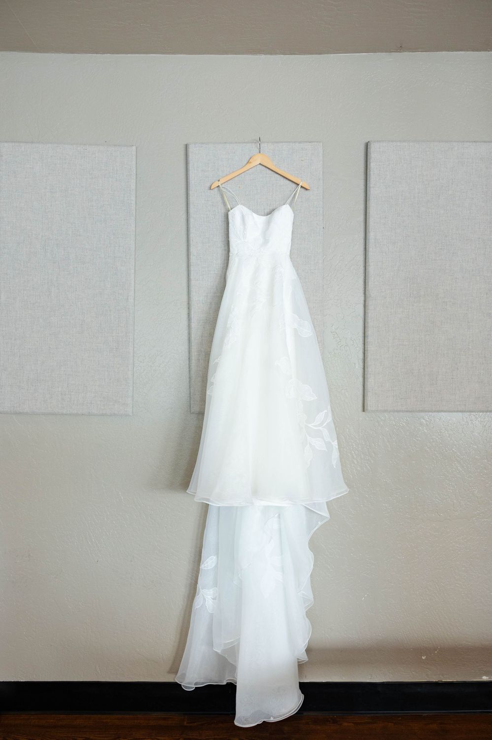 Bride's dress hanging before wedding at lakeside pavilion, chico, northern california wedding photographer