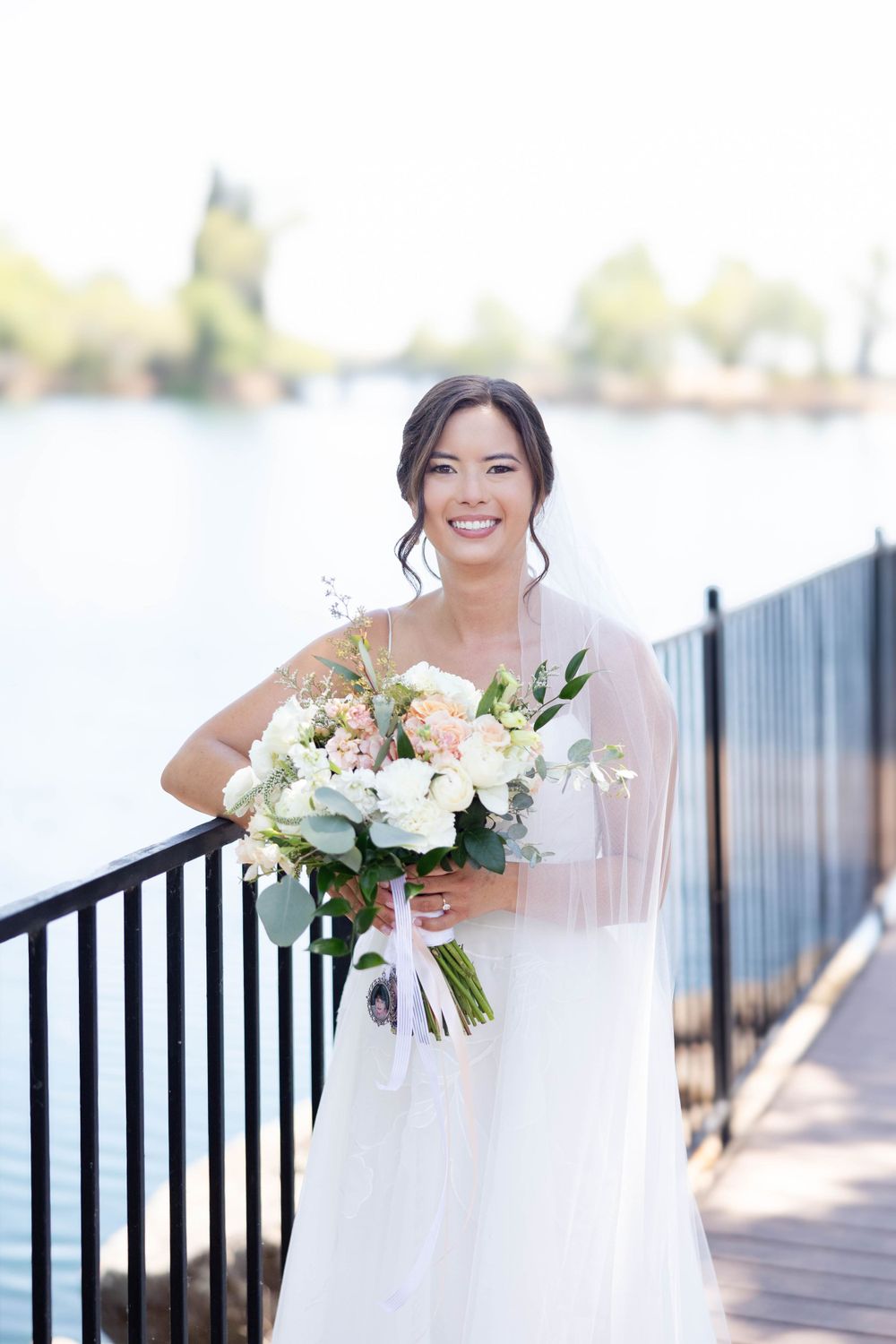 Bride at Lakeside Pavilion in Chico, Ca on the water's edge