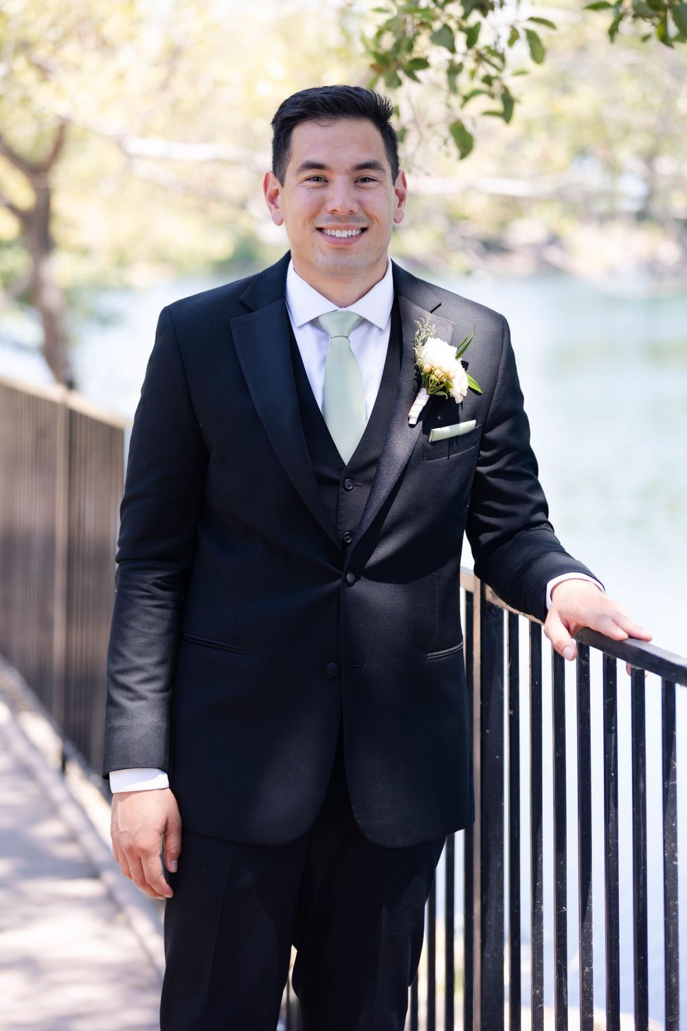 Groom at Lakeside Pavilion in Chico, Ca on the water's edge