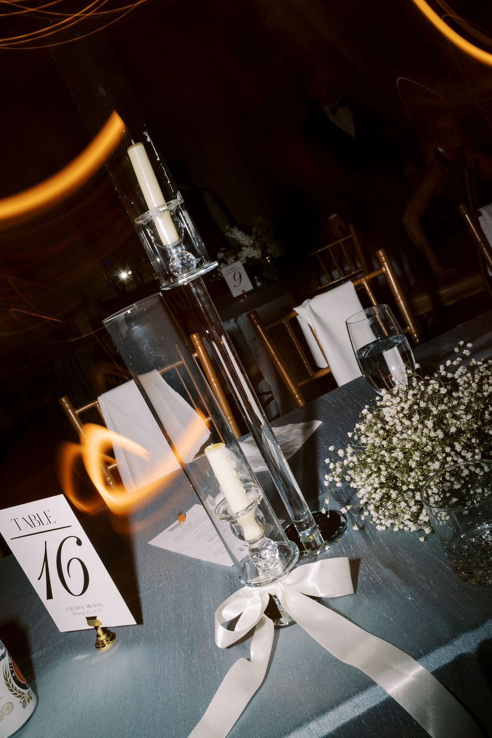 Elegant wedding table setting with candlesticks, table numbers, and baby's breath centerpieces. NC WEDDING PHOTOGRAPHER, LUXURY WEDDING PHOT
