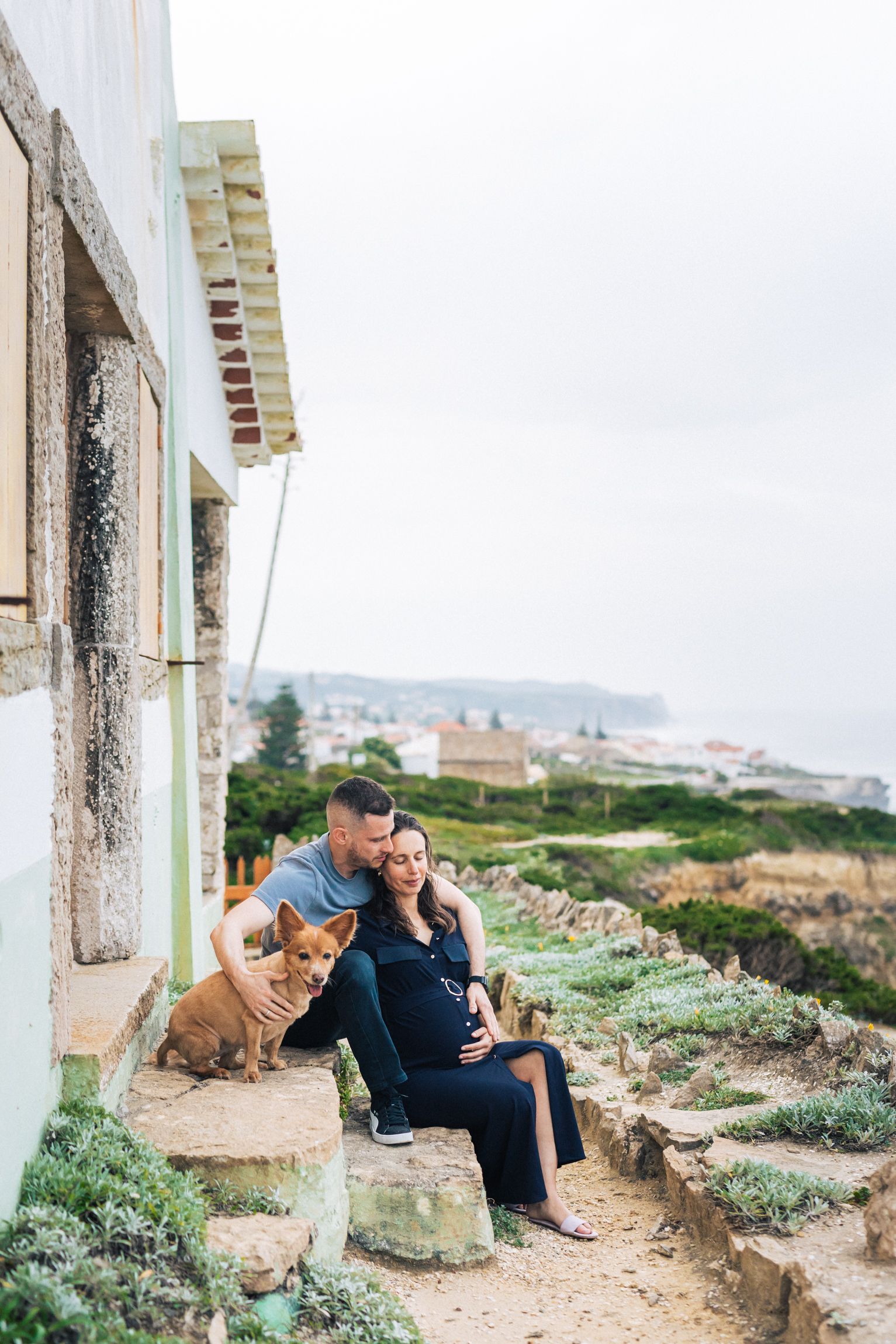 Natural and intimate pregnancy session at azenhas do Mar, portugal, capturing the beauty of a couple expecting their first child