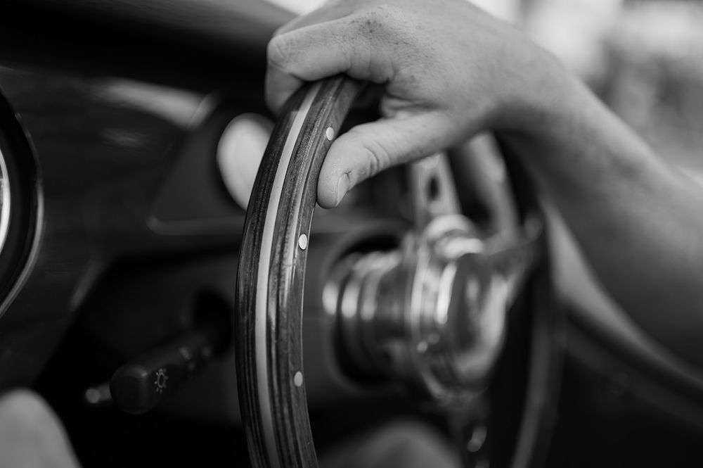 Intentional Franschhoek, Cape Town engagement session capturing soulful, effortless love with warm spring light, fun and a old school car.