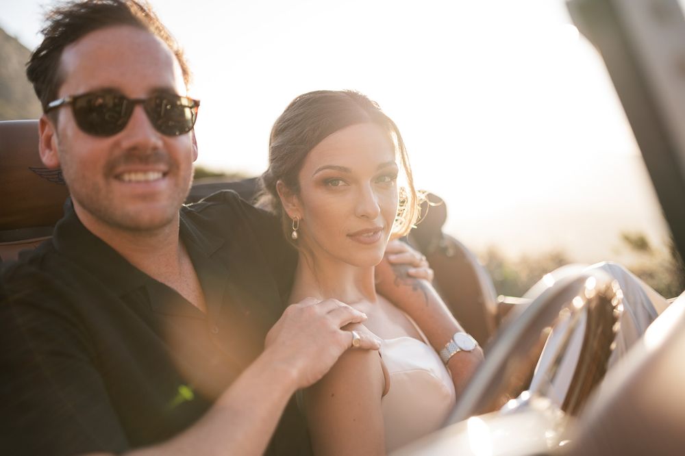 Intentional Franschhoek, Cape Town engagement session capturing soulful, effortless love with warm spring light, fun and a old school car.