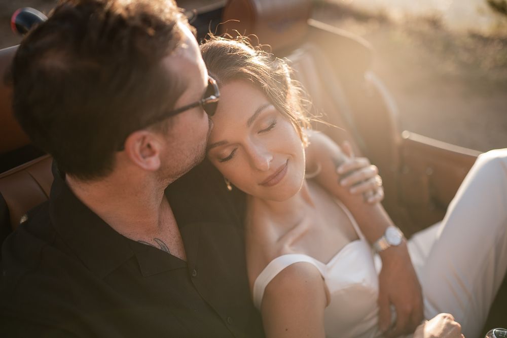 Intentional Franschhoek, Cape Town engagement session capturing soulful, effortless love with warm spring light, fun and a old school car.
