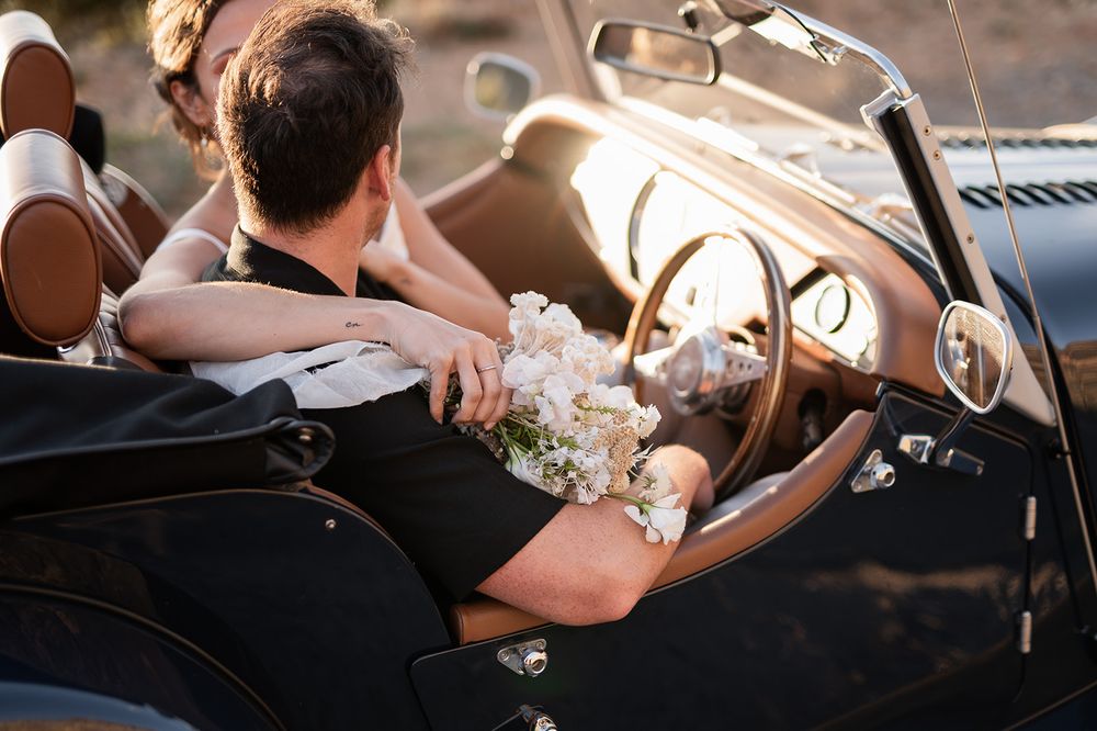 Intentional Franschhoek, Cape Town engagement session capturing soulful, effortless love with warm spring light, fun and a old school car.