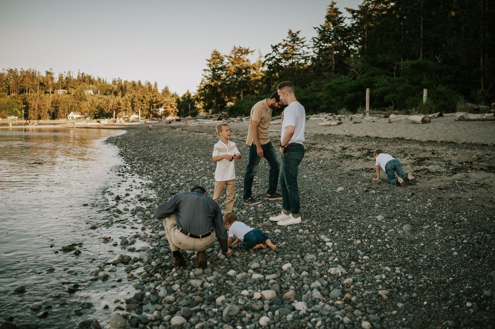 Comox Valley family photographer candid photo of kids playing on beach Kye Bay Beach Portraits taken by photographer Soulfull Photographs
