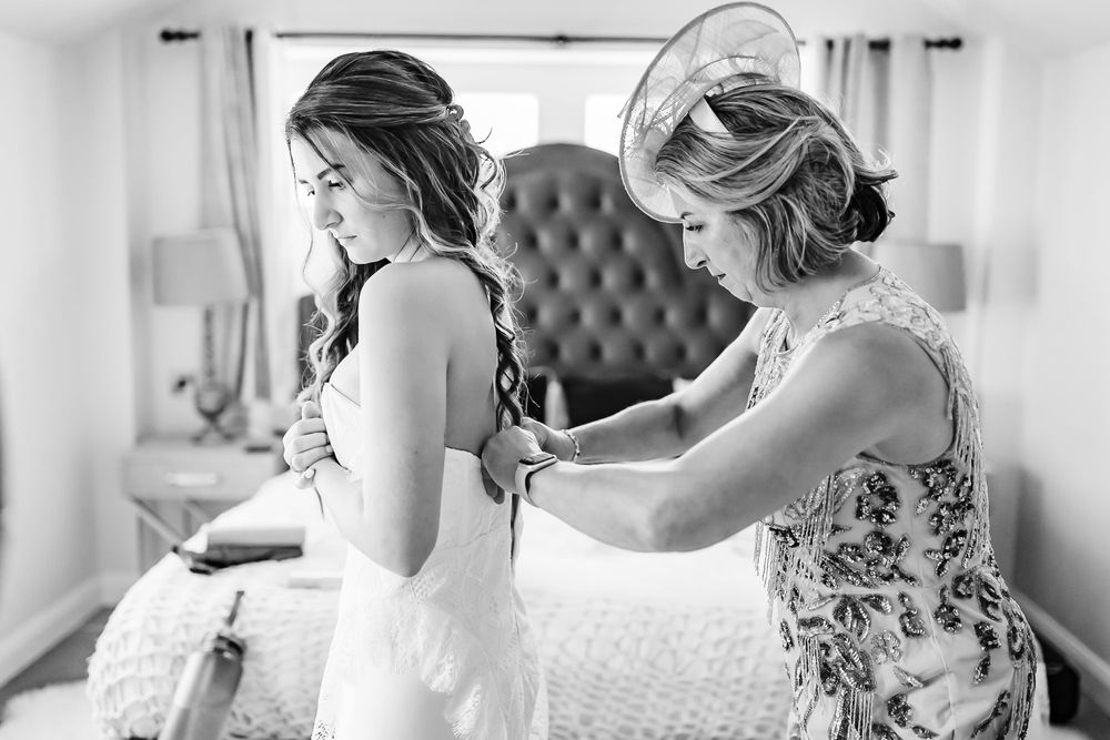 mum helping bride