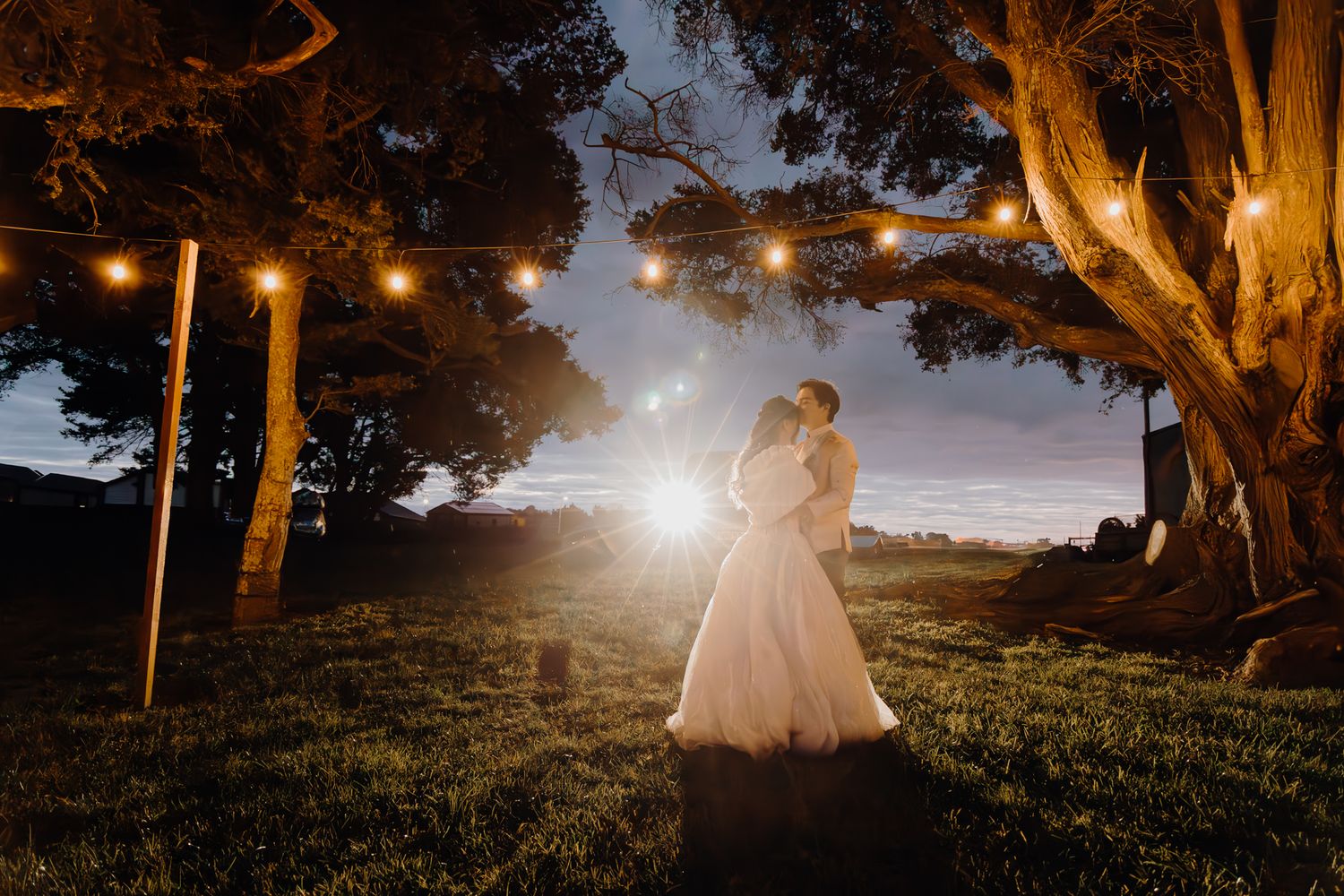 Couple's intimate moment at sunset in Winsford Gardens-Captured by Apertured Media-Auckland Wedding Photographer.