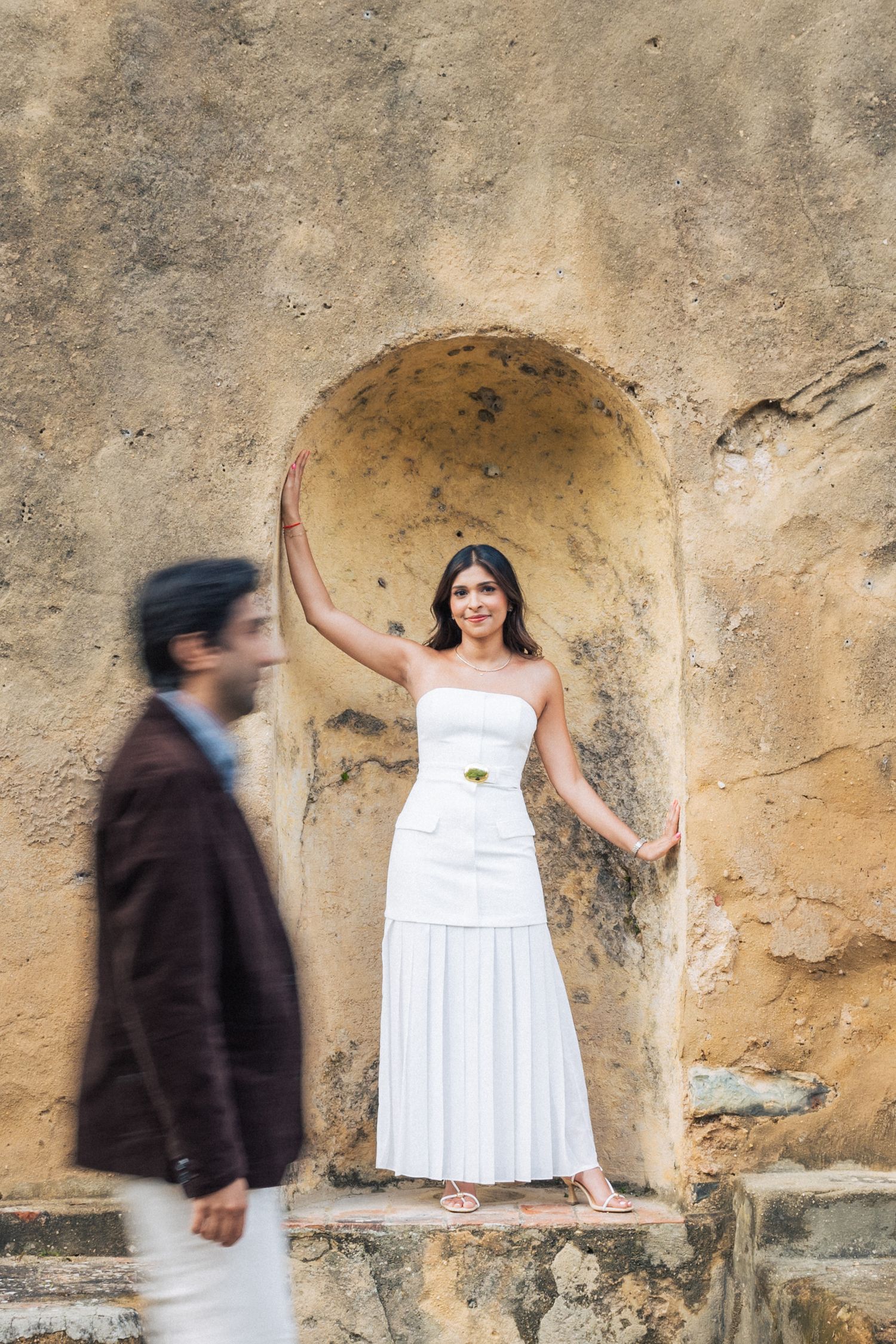 Romantic engagement photo-shoot in Sintra, Portugal, with an Indian couple exploring Penha Longa. By a destination wedding Photographer