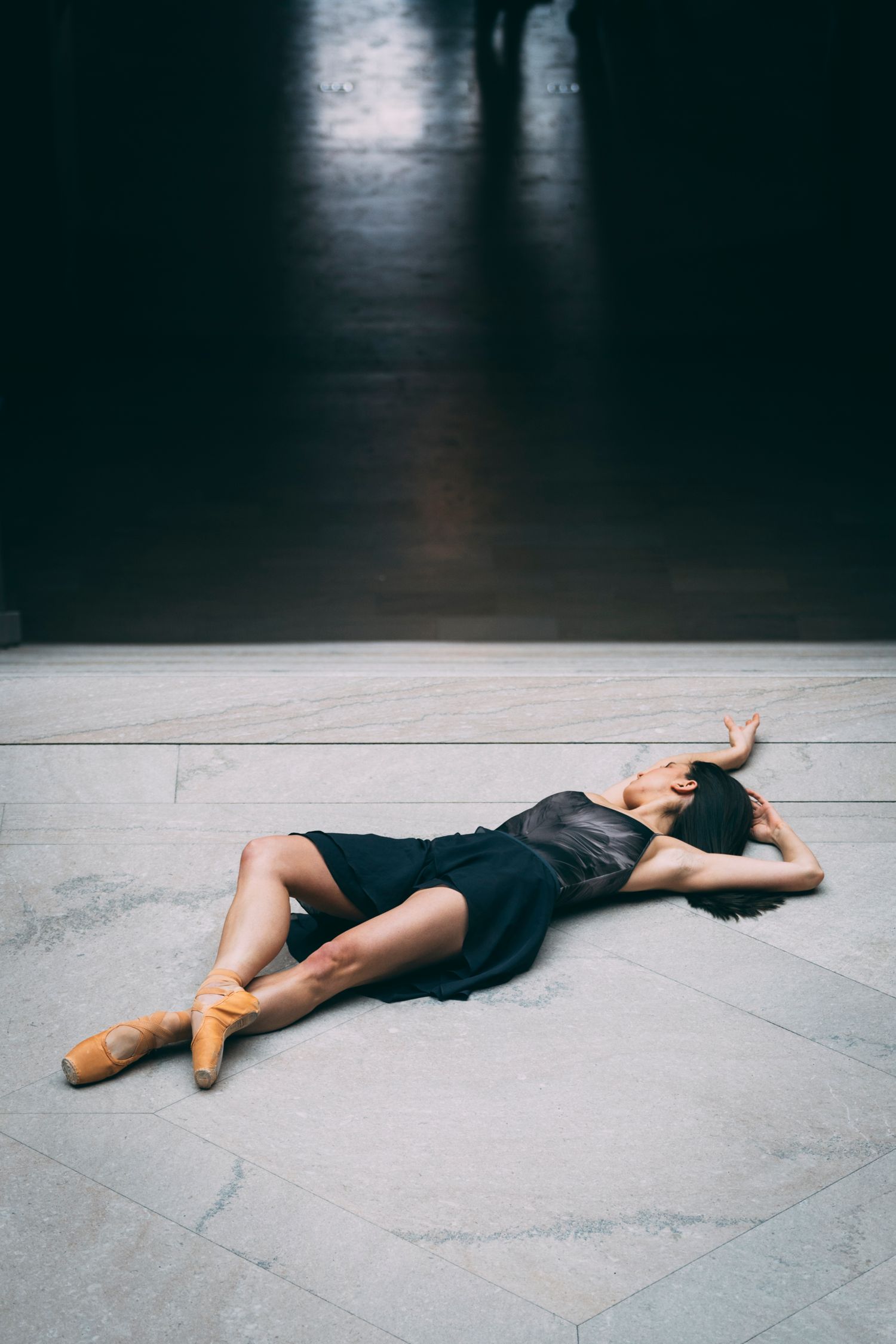 Tampa ballet dance photography of a ballerina in red skirt photographed on stairs in downtown Tampa Florida