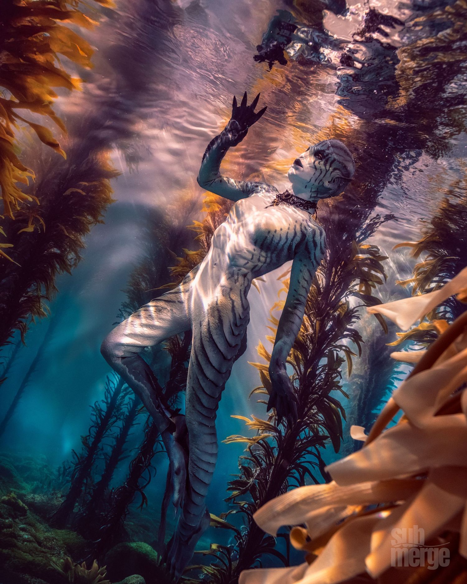 Underwater figure in white flowing fabric swimming through a kelp forest with dramatic lighting and ethereal atmosphere.