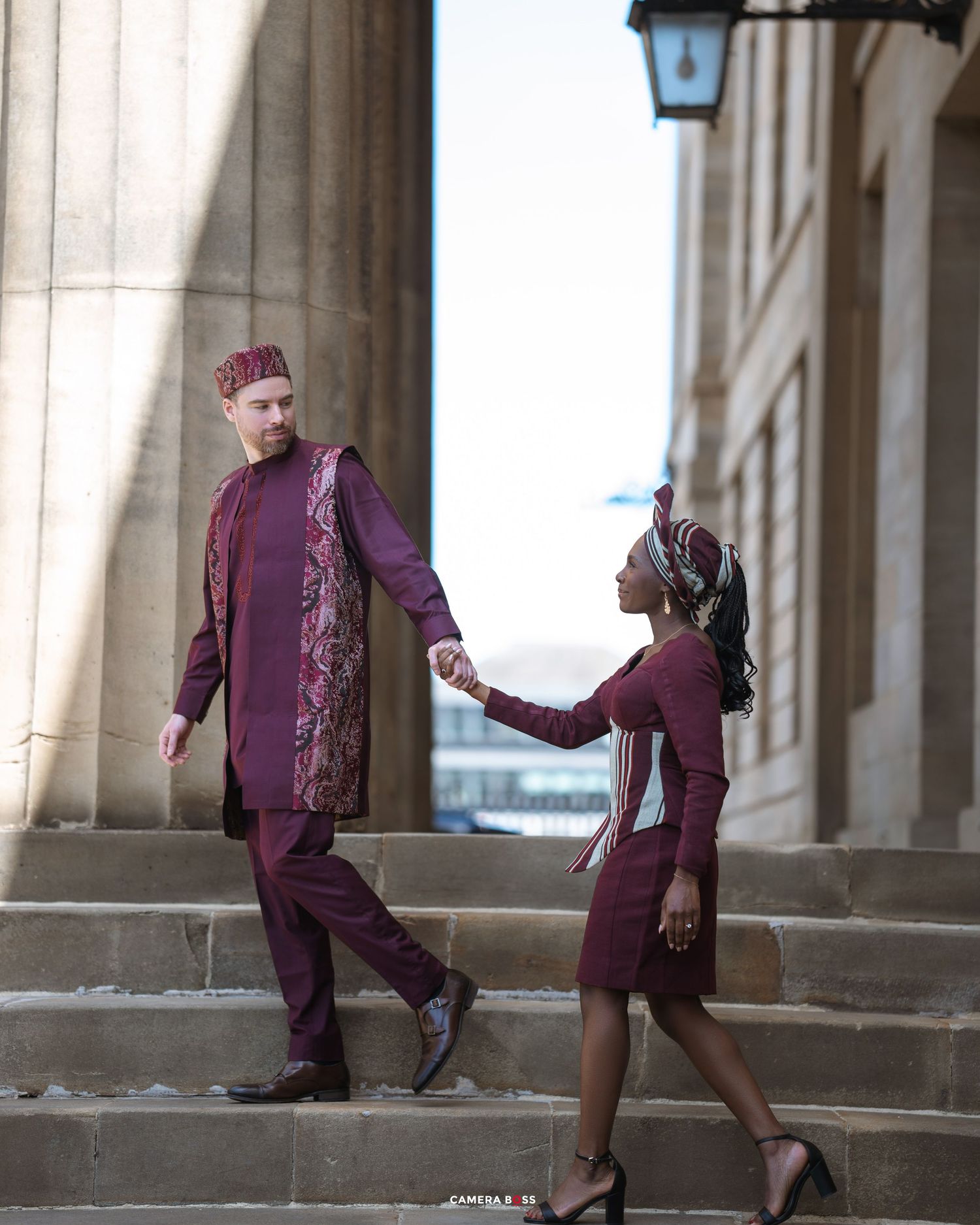 A figure in a purple suit strikes various dynamic poses in a sequence of connected architectural shots.