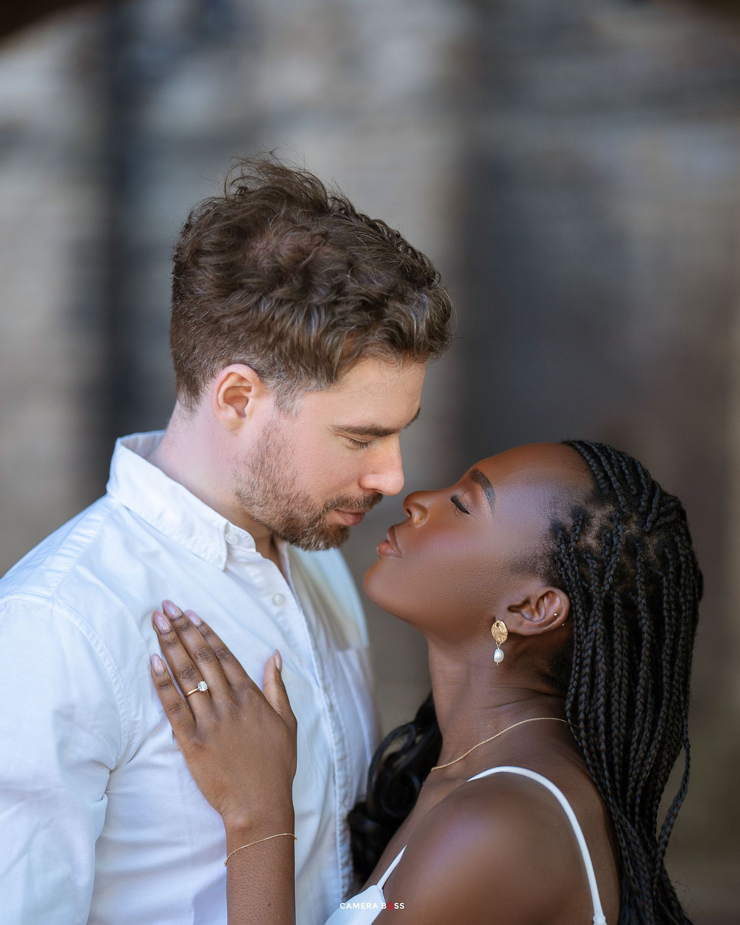A romantic couple shares an intimate moment in a series of candid photos showing their natural chemistry and affection.