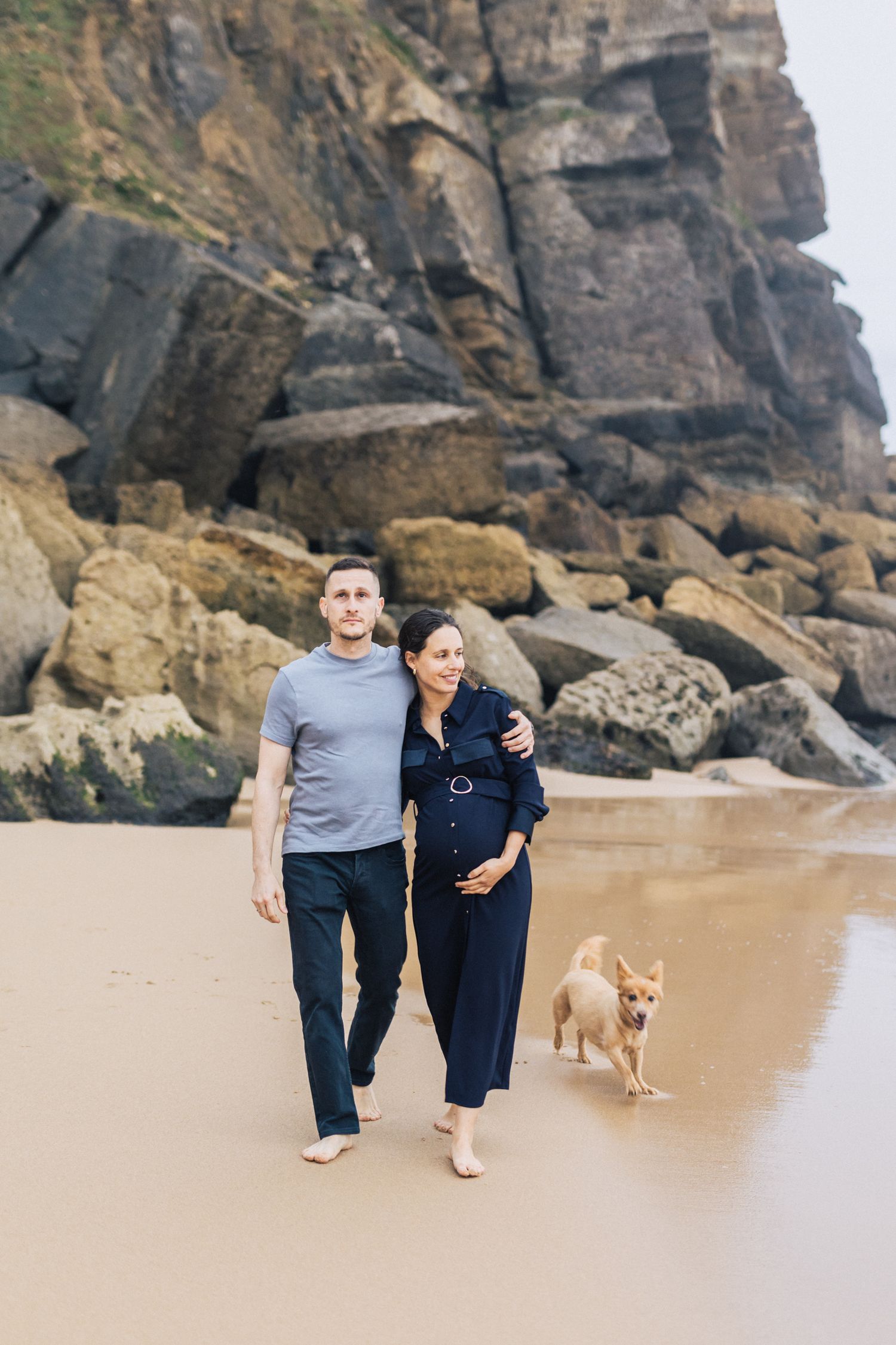 Natural and intimate pregnancy session at azenhas do Mar, portugal, capturing the beauty of a couple expecting their first child