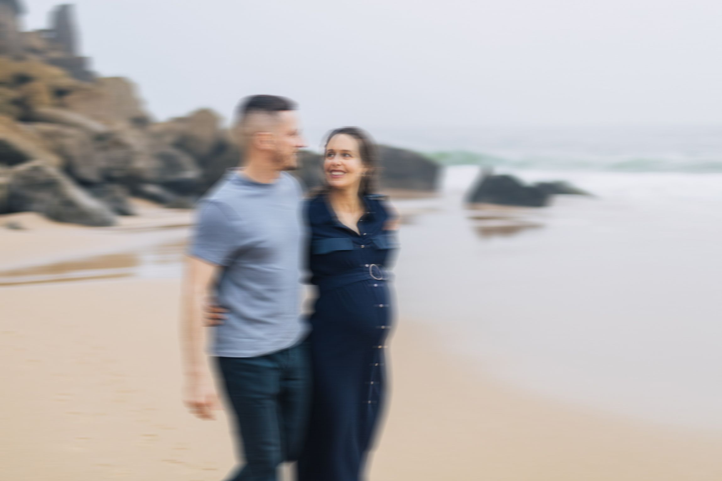 Natural and intimate pregnancy session at azenhas do Mar, portugal, capturing the beauty of a couple expecting their first child