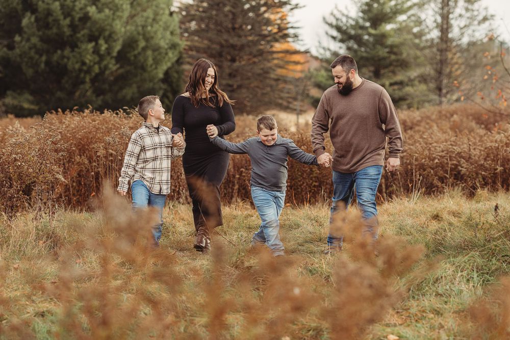 Professional photo of a family of four outdoors