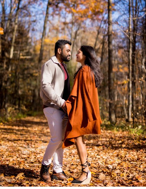 Intimate engagement portrait, couple embracing
