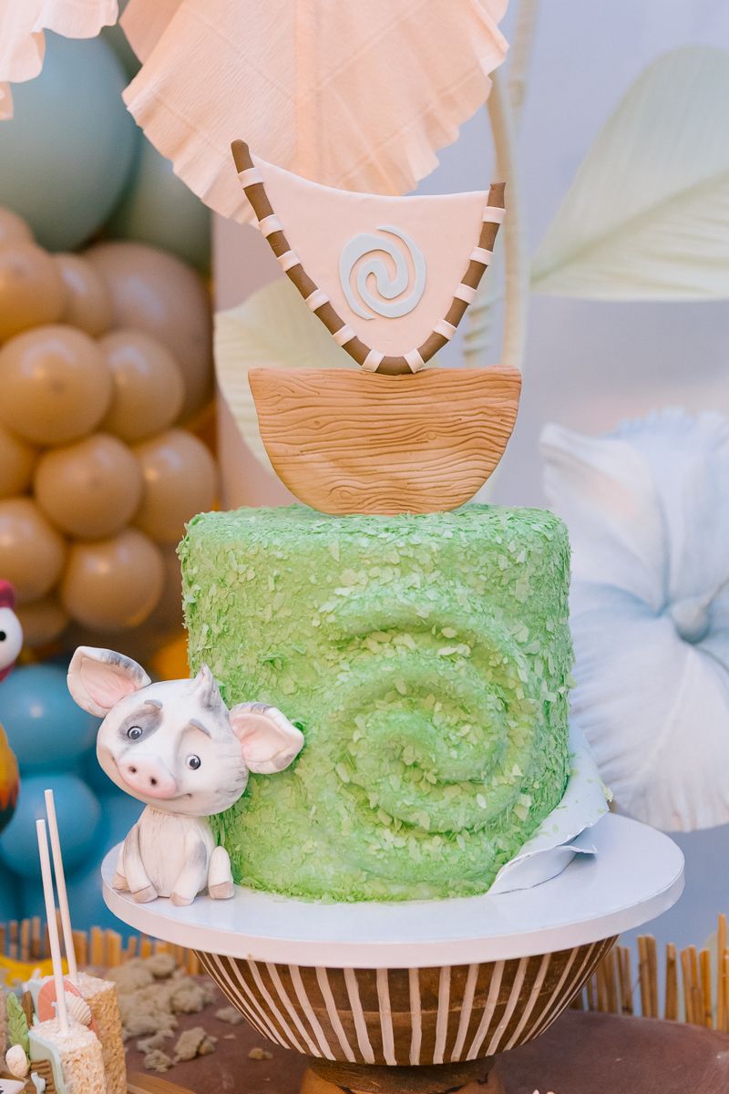 Moana-inspired birthday cake with ocean waves and island details, celebrating a magical themed party in NYC