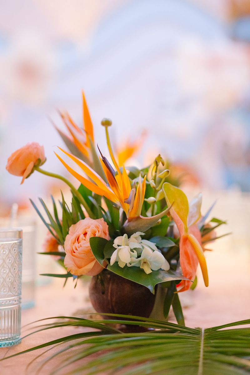 Lush tropical flower centerpiece adding island elegance to a Moana birthday celebration in NYC by Paula Brearley NYC Family Photographer