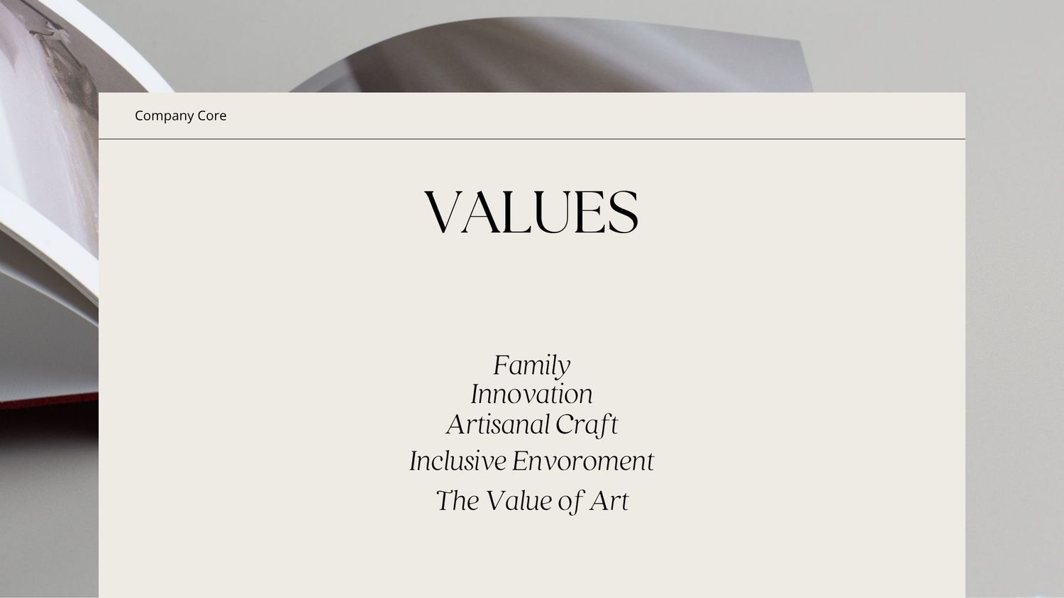 Black text displaying company values including Family, Innovation, Artisanal Craft, Inclusive Environment printed on white paper.